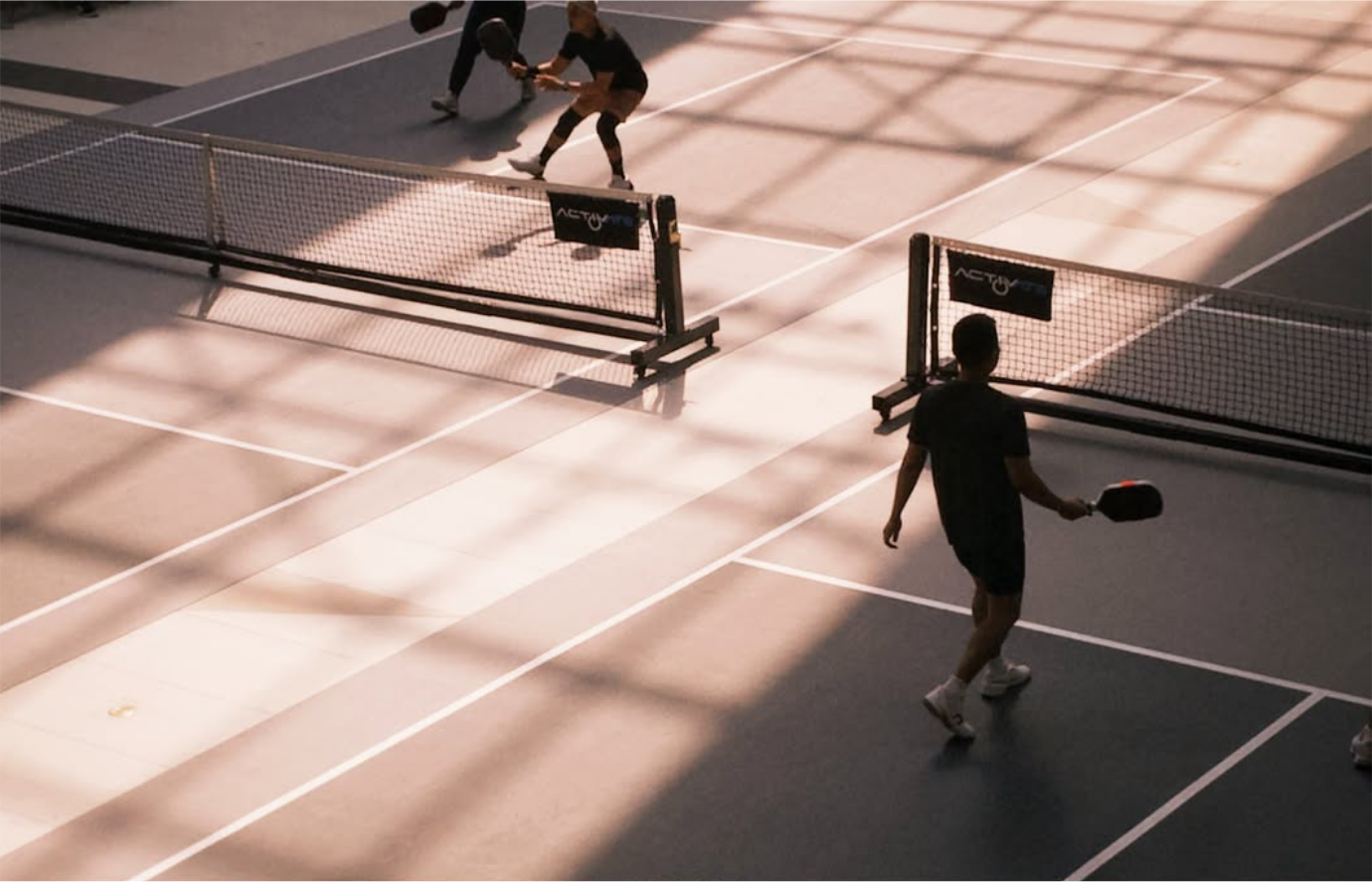 Pickleball game on court